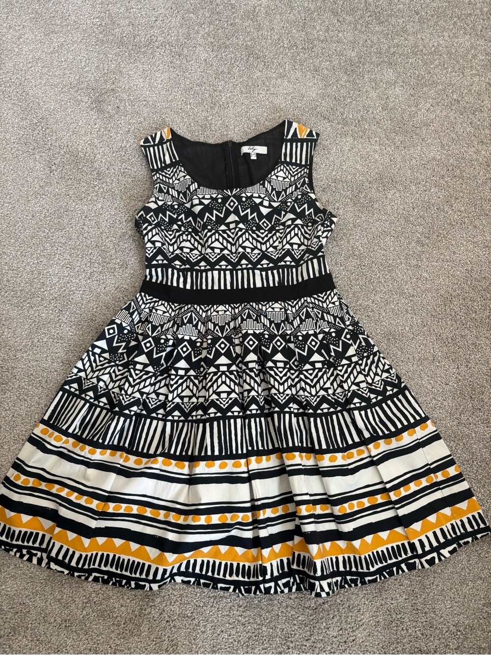 Black & White Geometric Fit-and-Flare Dress with Mustard Accents